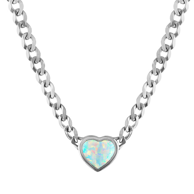 White gold cuban link chain necklace with a heart shaped bezeled opal in the center.