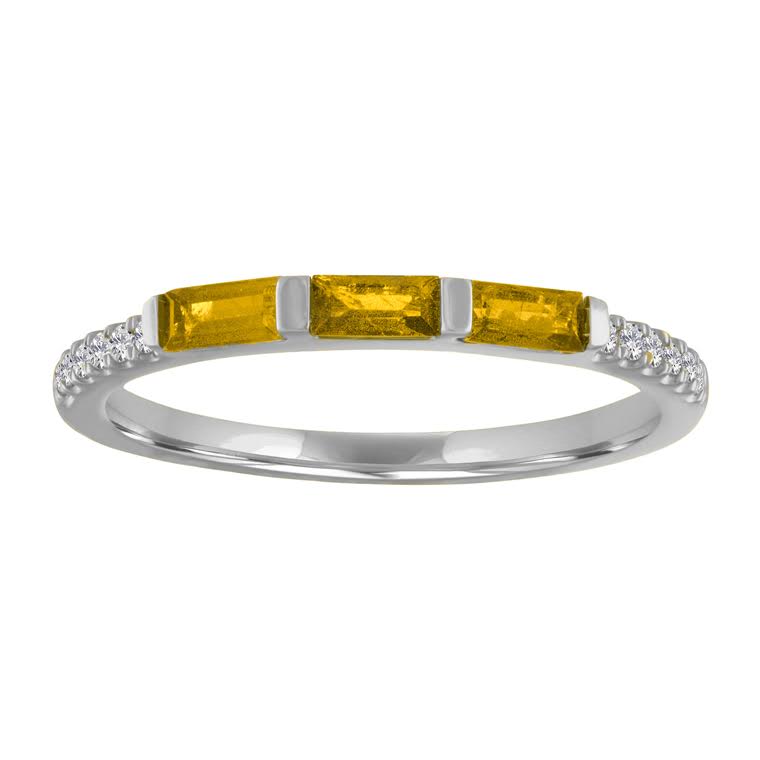 White gold skinny band with three citrine baguettes and round diamonds on the shank.