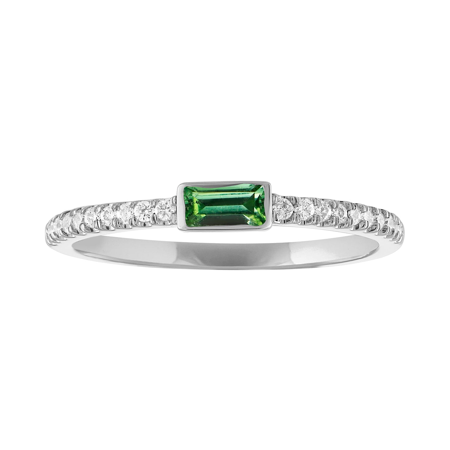 White gold skinny band with a bezeled emerald baguette in the center and round diamonds on the shank.