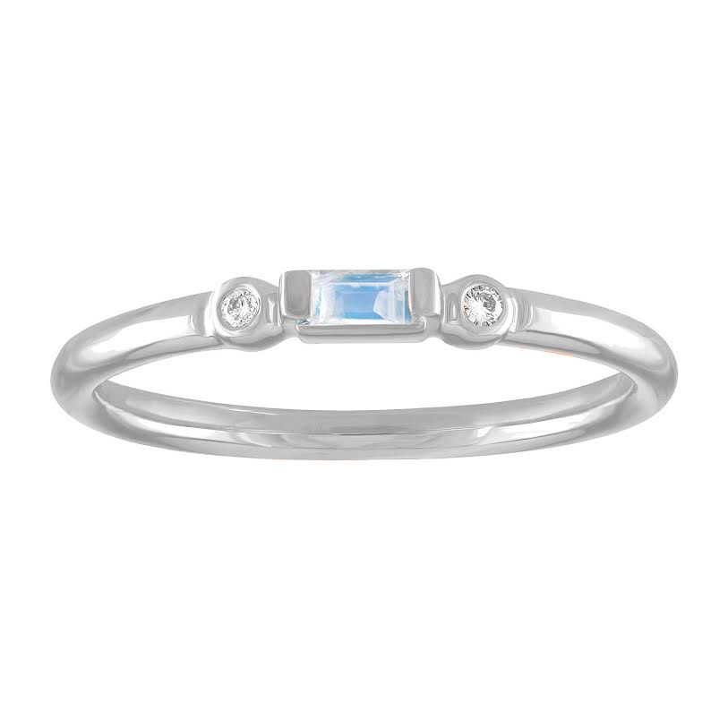 White gold skinny band with a moonstone baguette in the center and two round diamonds on the side.