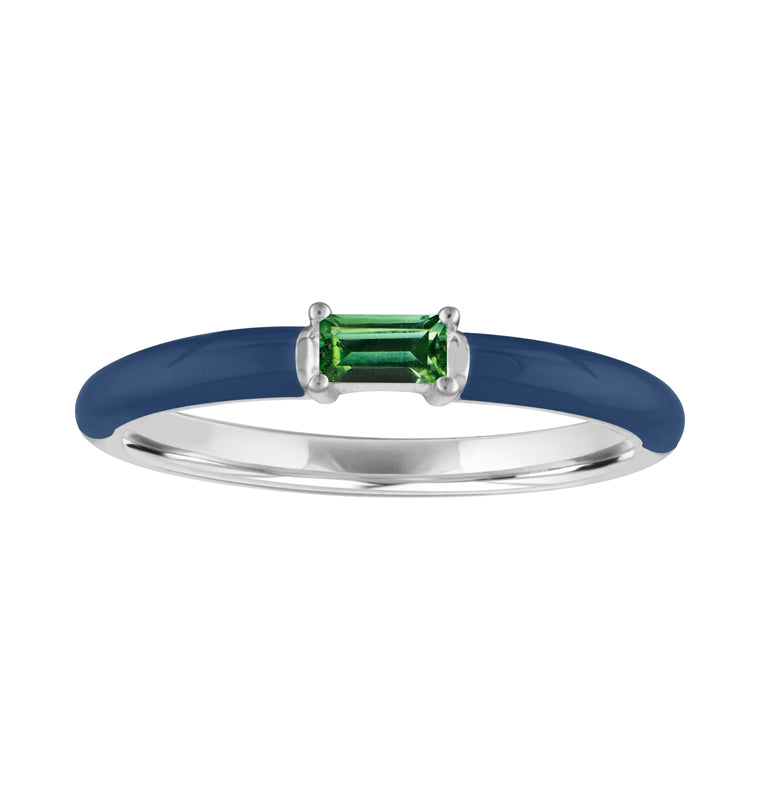 White gold skinny band with navy enamel and emerald baguette in the center.