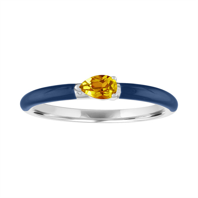 White gold skinny band with blue enamel and a pear shaped citrine in the center.