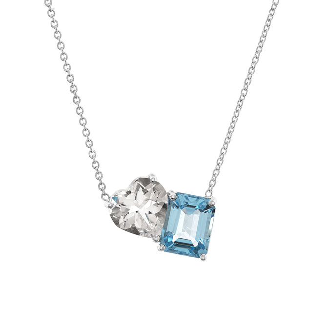 White gold two stone necklace with a heart shaped White Sapphire and an emerald cut Blue Topaz.