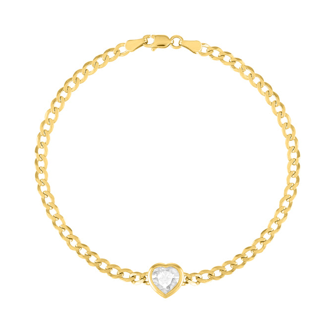 Yellow gold cuban link chain bracelet with a heart shaped bezeled white topaz in the center.