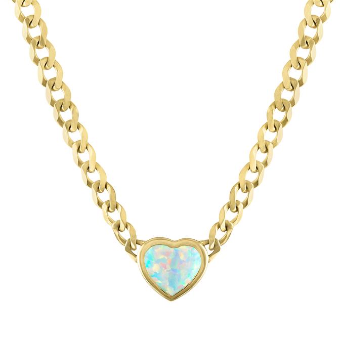Yellow gold cuban link chain necklace with a heart shaped bezeled opal in the center.
