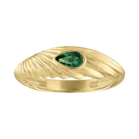 Yellow gold fluted band with an bezeled emerald in the center. 