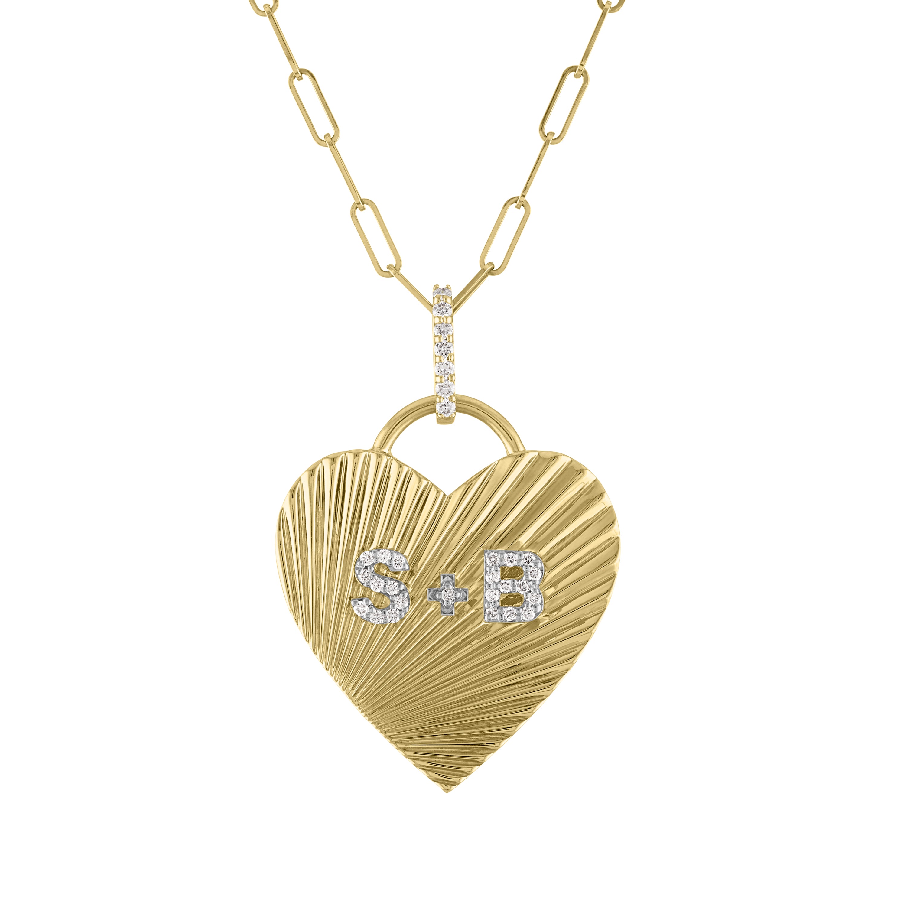 Yellow gold fluted heart charm with diamond initials, a diamond bail and a paperclip chain.