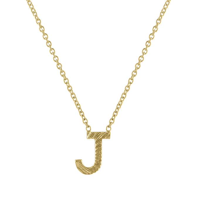 Yellow gold mini initial necklace with fluting.