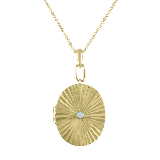 Yellow gold pleated oval locket with a small round opal in the center.