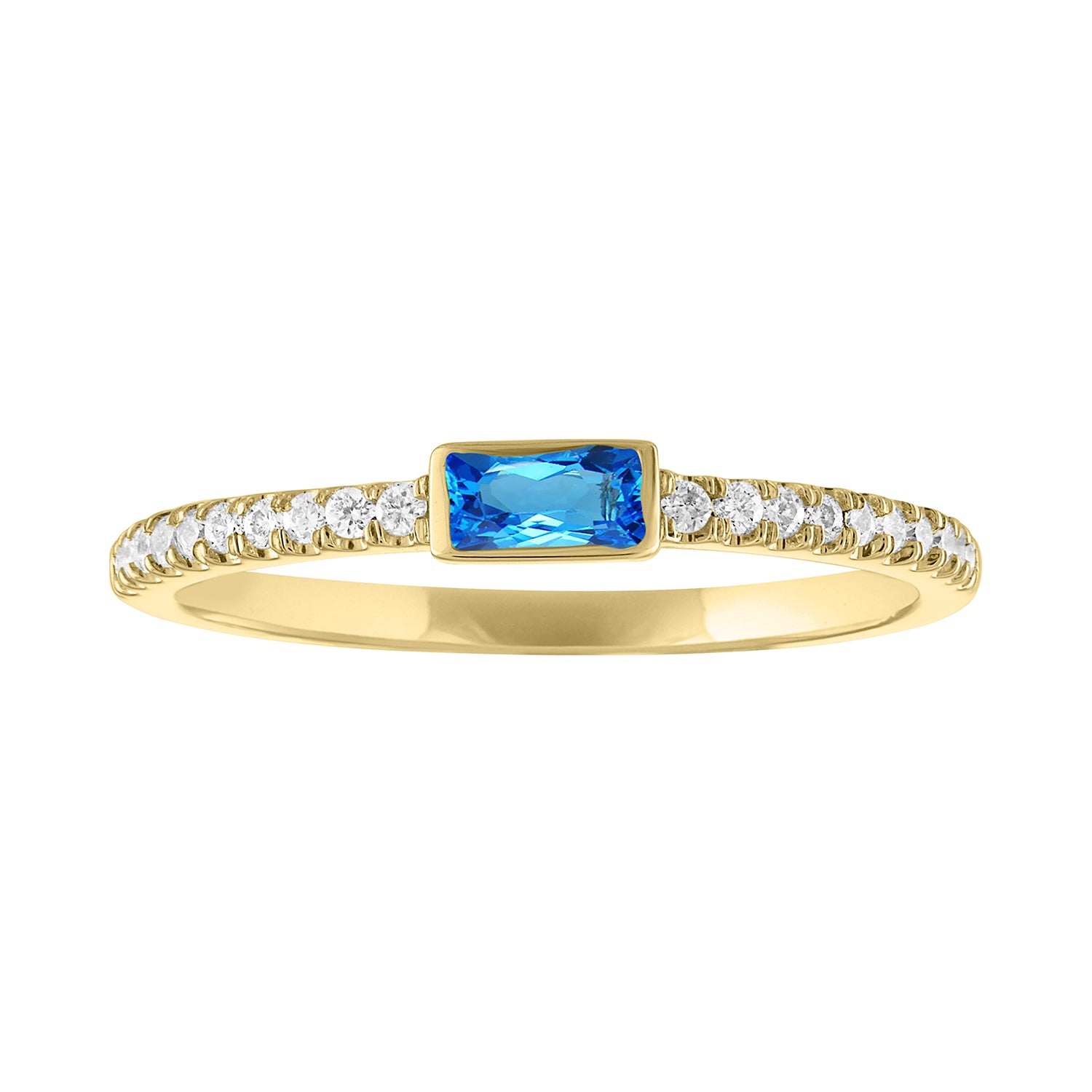 Yellow gold skinny band with a bezeled blue topaz baguette in the center and round diamonds on the shank.
