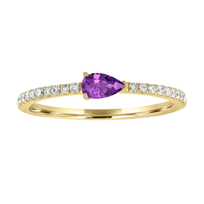 Yellow gold skinny band with a pear shaped amethyst in the center and round diamonds on the shank.