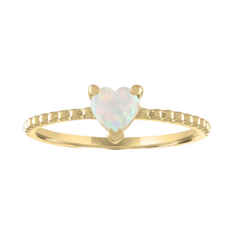Yellow gold beaded skinny band with a heart shaped opal in the center. 