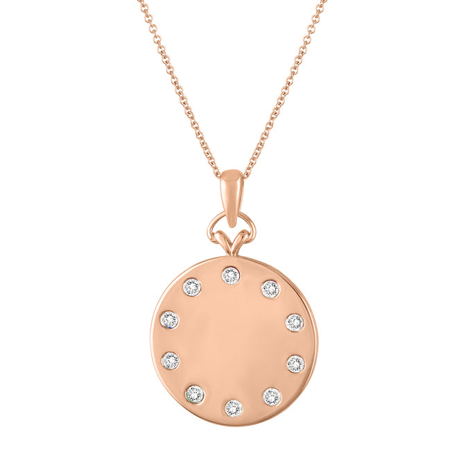 Rose gold disc necklace with round diamonds around the border.