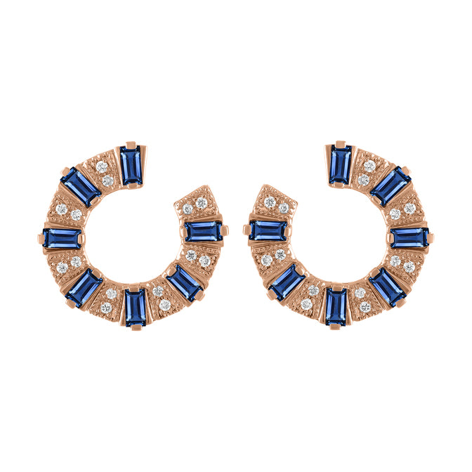 Rose gold pair of earrings with sapphire baguettes and round diamonds.