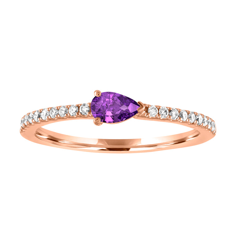 Rose gold skinny band with a pear shaped amethyst in the center and round diamonds on the shank. 
