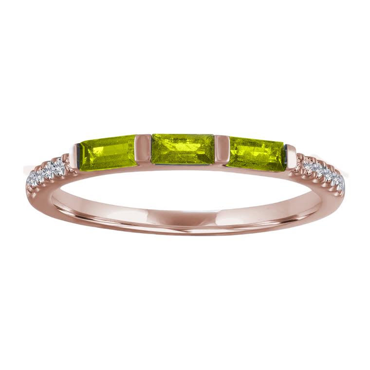 Rose gold skinny band with three peridot baguettes and round diamonds on the shank. 