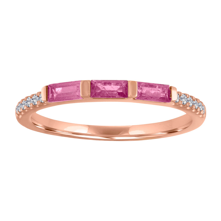 Rose gold skinny band with three pink tourmaline baguettes and round diamonds on the shank.