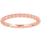 Rose gold beaded skinny band.