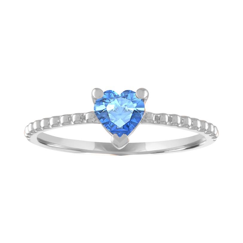 White gold beaded skinny band with a heart shaped blue topaz in the center. 