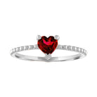 White gold beaded skinny band with a heart shaped garnet in the center. 