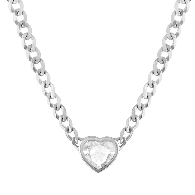 White gold cuban link chain necklace with a heart shaped bezeled white topaz in the center. 