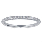 White gold skinny band with round diamonds.