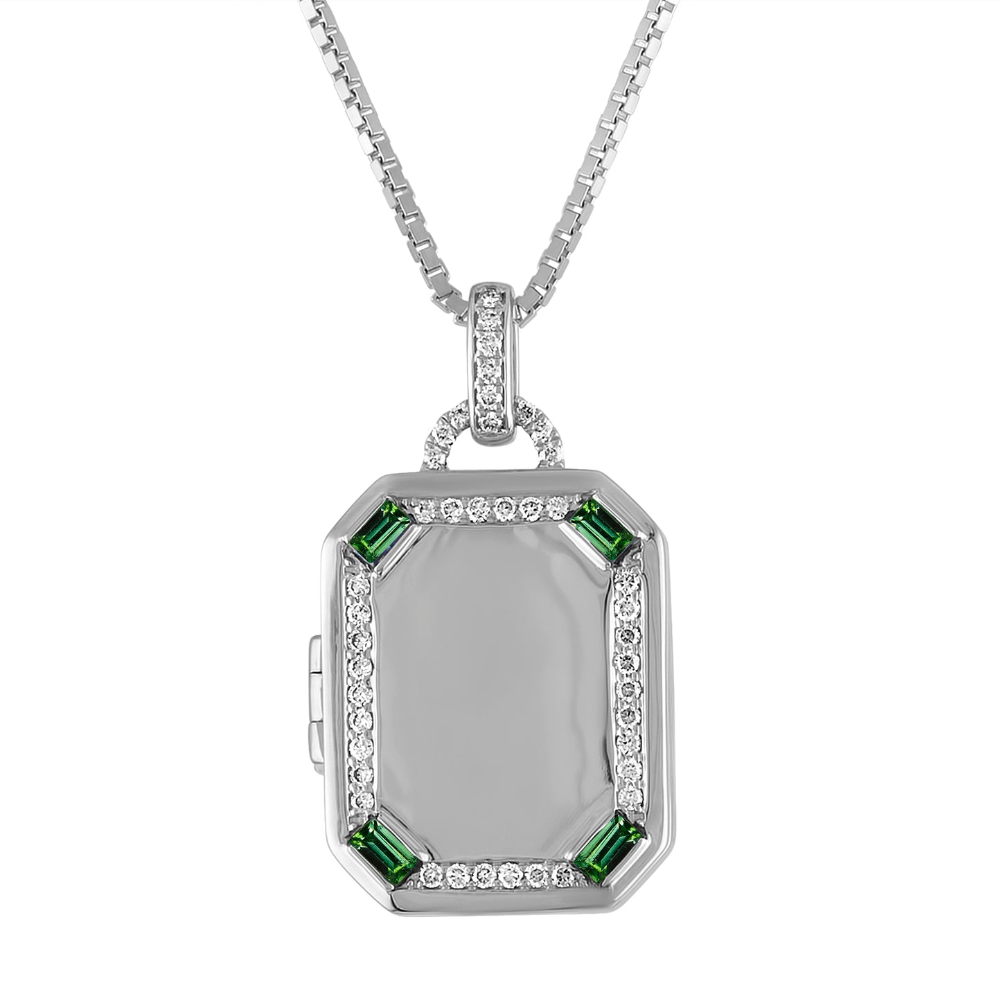 White gold rectangle locket with emerald baguettes and round diamonds.