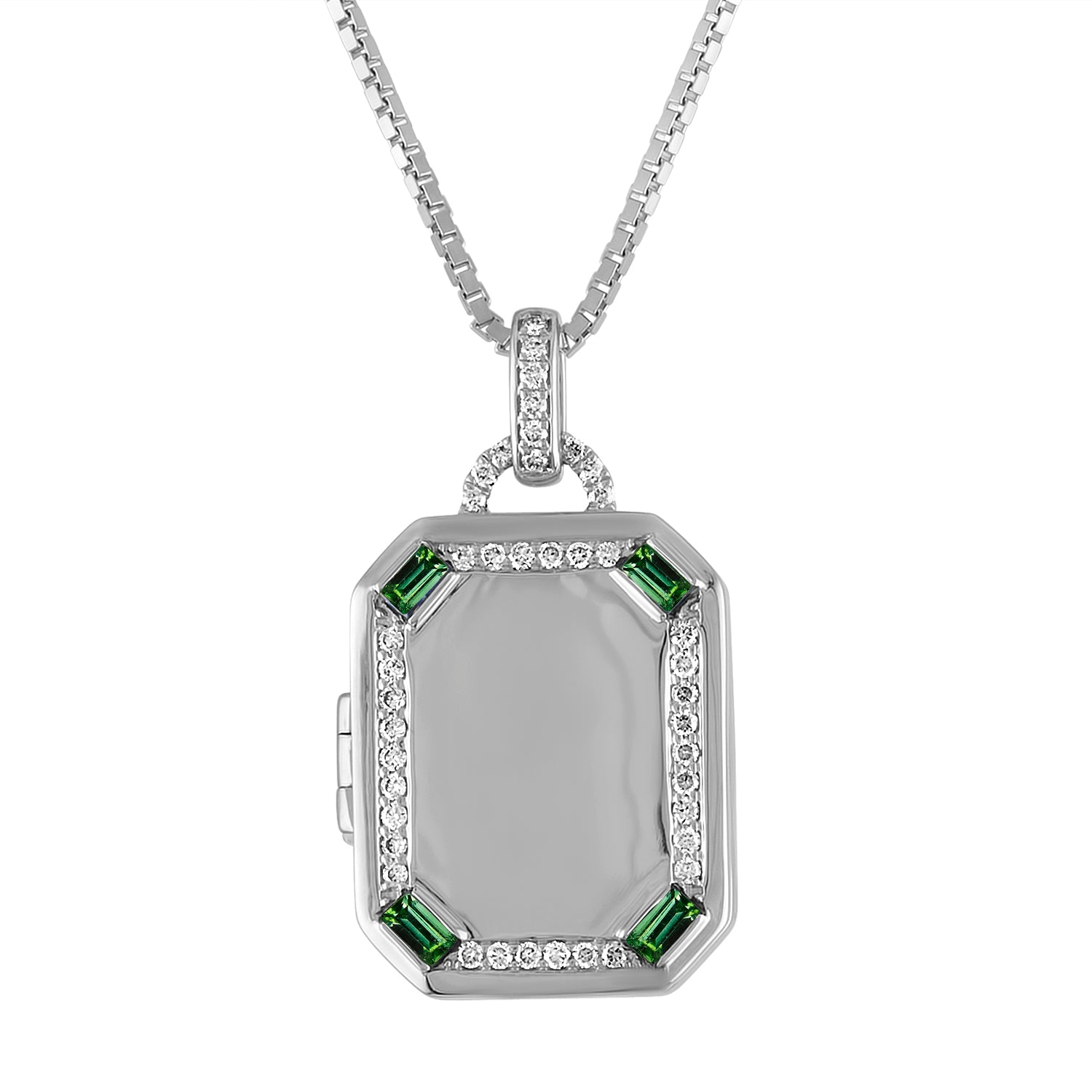 White gold rectangle locket with emerald baguettes and round diamonds.