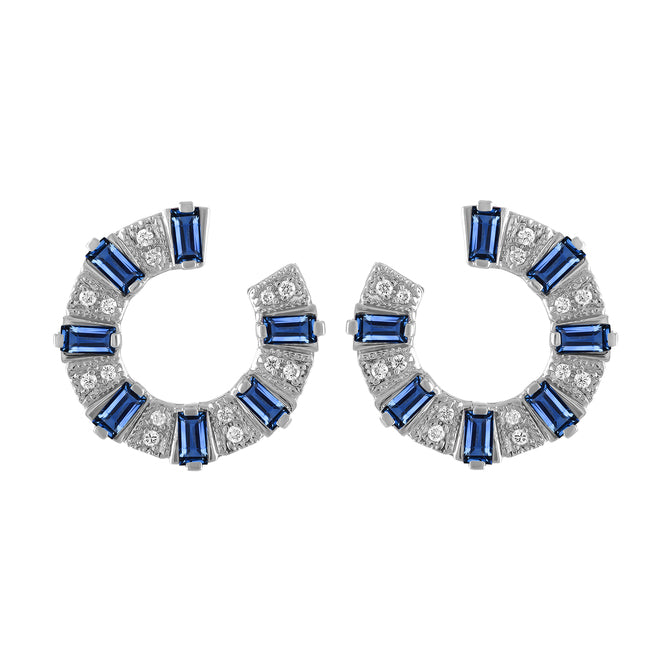 White gold pair of earrings with sapphire baguettes and round diamonds.