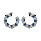 White gold pair of earrings with sapphire baguettes and round diamonds.