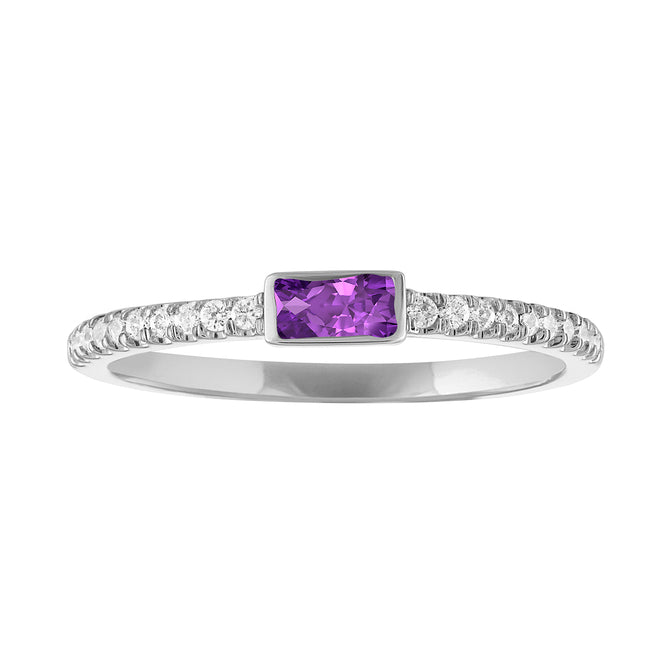 White gold skinny band with a bezeled amethyst baguette in the center and round diamonds on the shank.