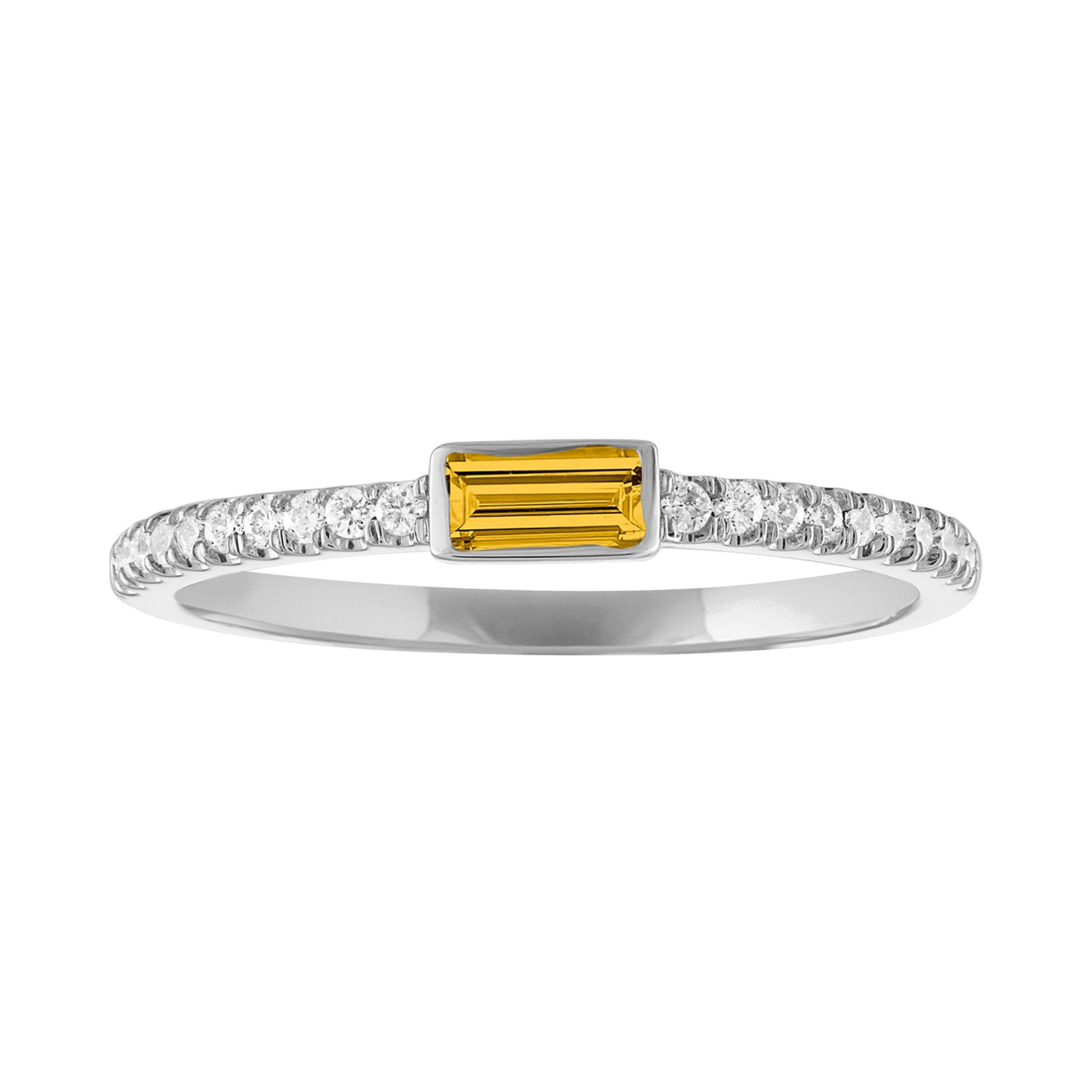 White gold skinny band with a bezeled citrine baguette in the center and round diamonds on the shank. 