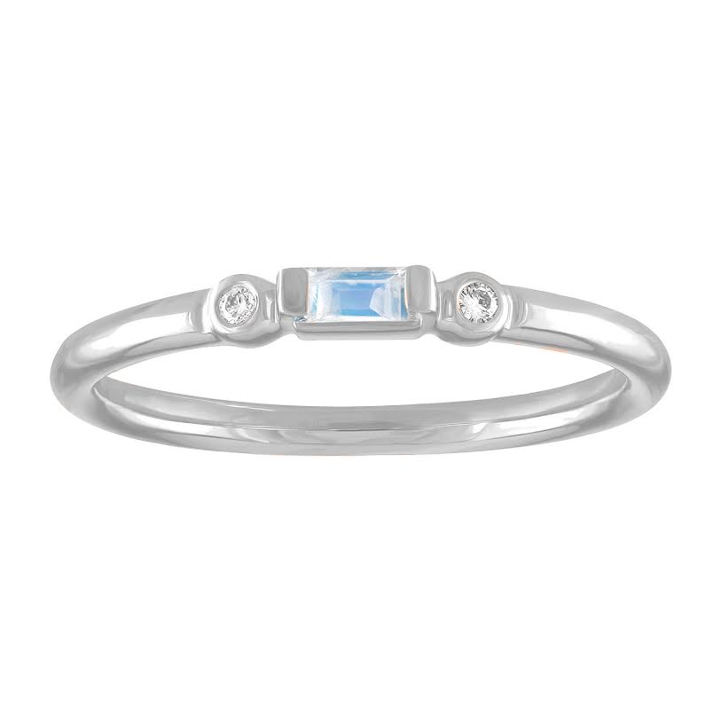 White gold skinny band with a moonstone baguette in the center and two round diamonds on the side. 