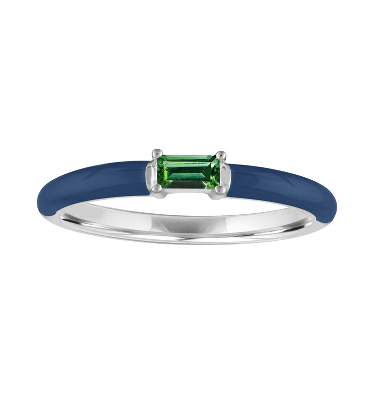 White gold skinny band with navy enamel and emerald baguette in the center. 