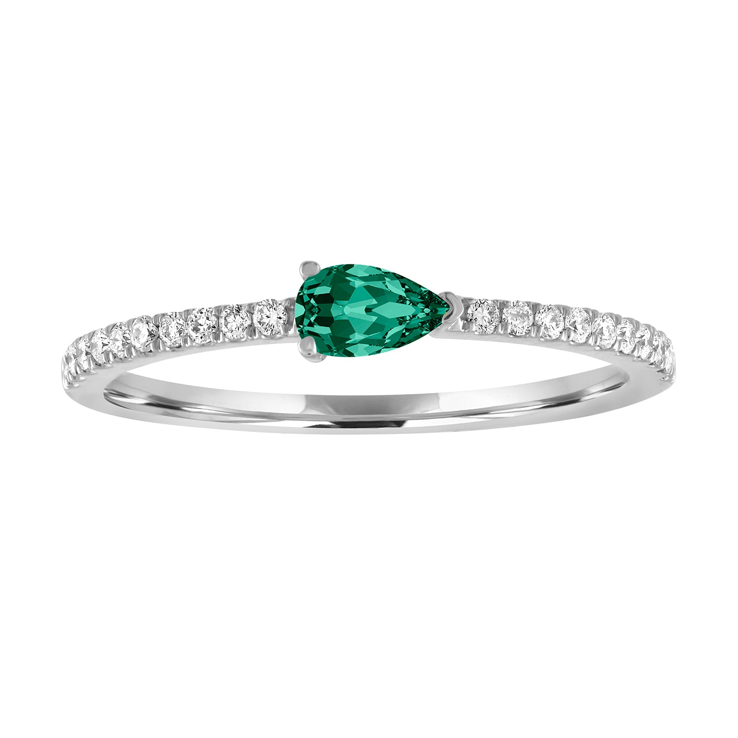 White gold skinny band with a pear shaped emerald in the center and round diamonds on the shank. 