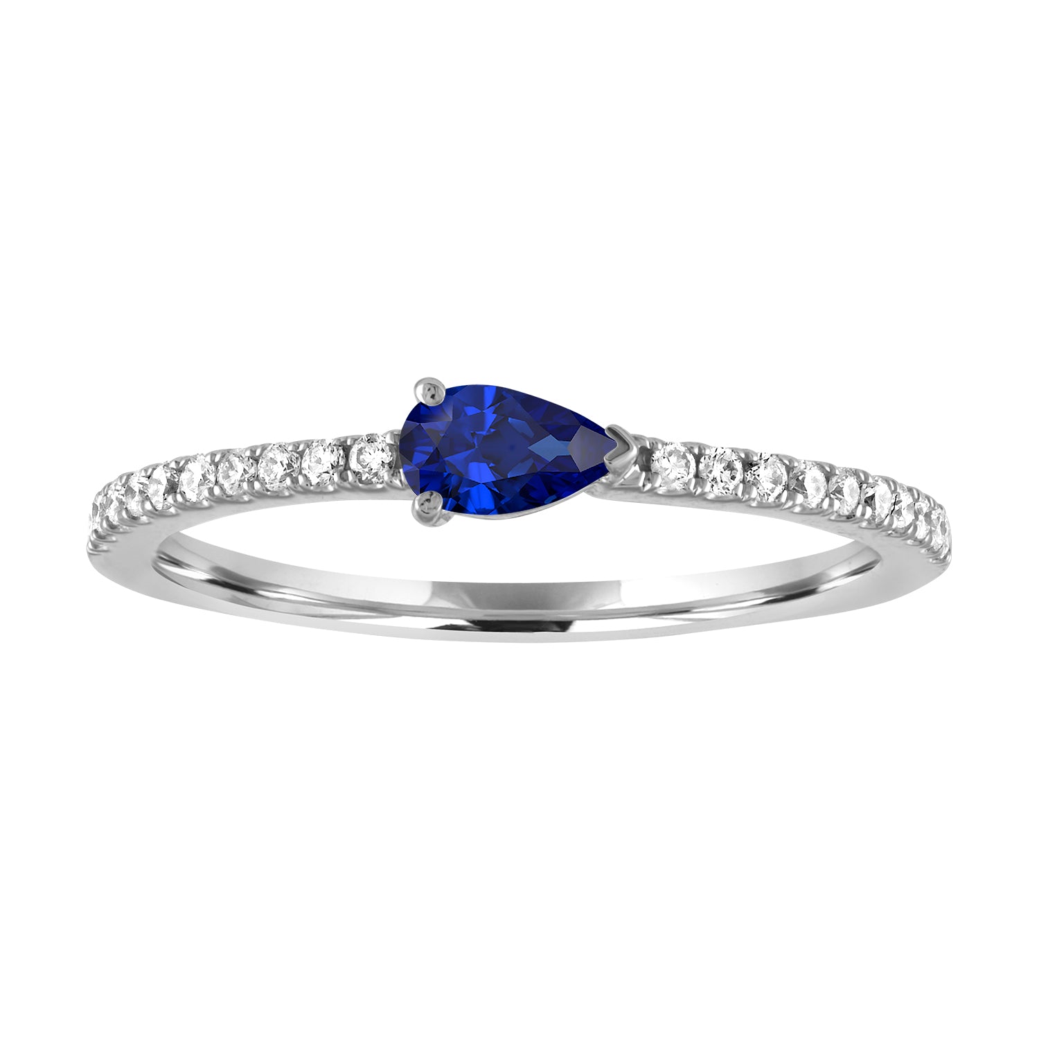 White gold skinny band with a pear shaped sapphire in the center and round diamonds on the shank. 