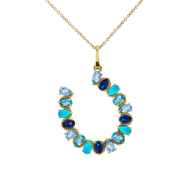 Yellow gold horseshoe necklace with pear shaped aquamarines, blue topaz's, sapphires, and turquoises. 