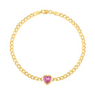 Yellow gold cuban link chain bracelet with a heart shaped bezeled pink tourmaline in the center.