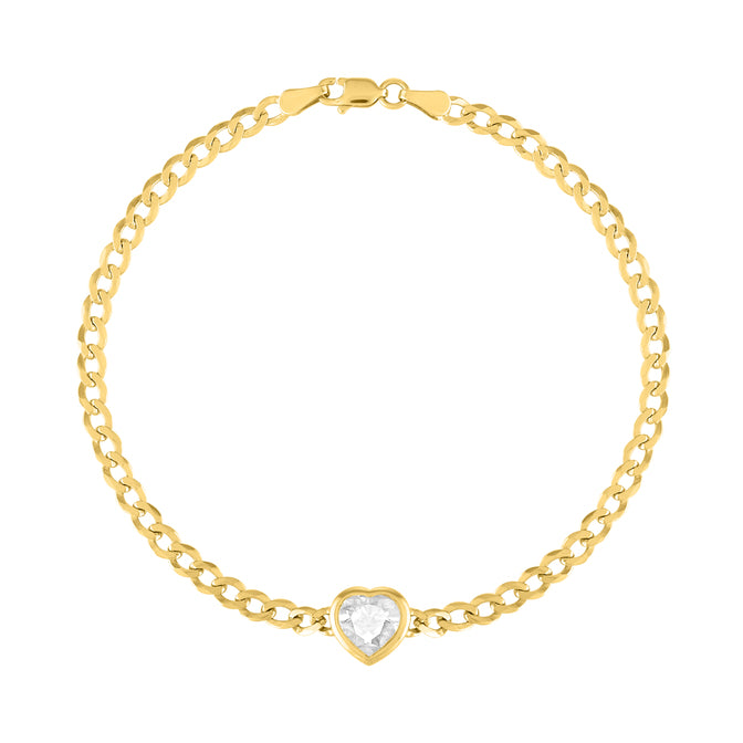 Yellow gold cuban link chain bracelet with a heart shaped bezeled white topaz in the center. 