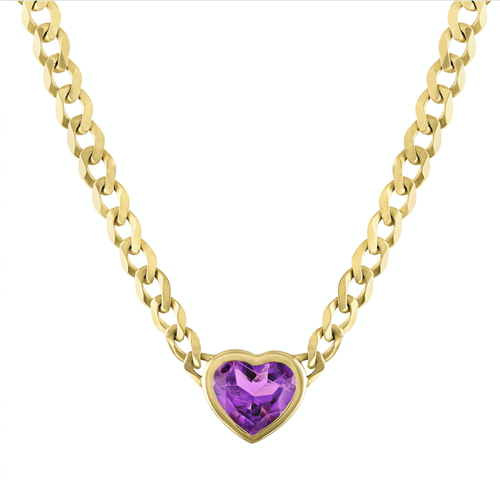 Yellow gold cuban link chain necklace with a heart shaped bezeled amethyst in the center. 