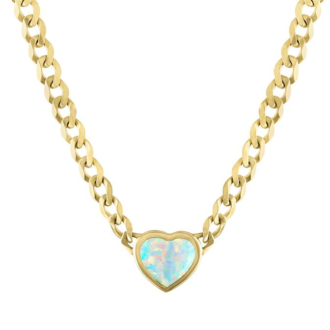 Yellow gold cuban link chain necklace with a heart shaped bezeled opal in the center. 