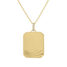 Yellow gold large engravable dogtag with fluting and a diamond bail. 