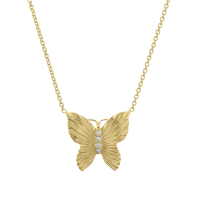 Yellow gold fluted butterfly necklace with round diamonds down the middle. 