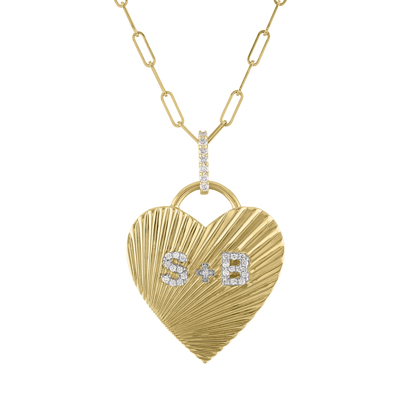 Yellow gold fluted heart charm with diamond initials, a diamond bail and a paperclip chain.