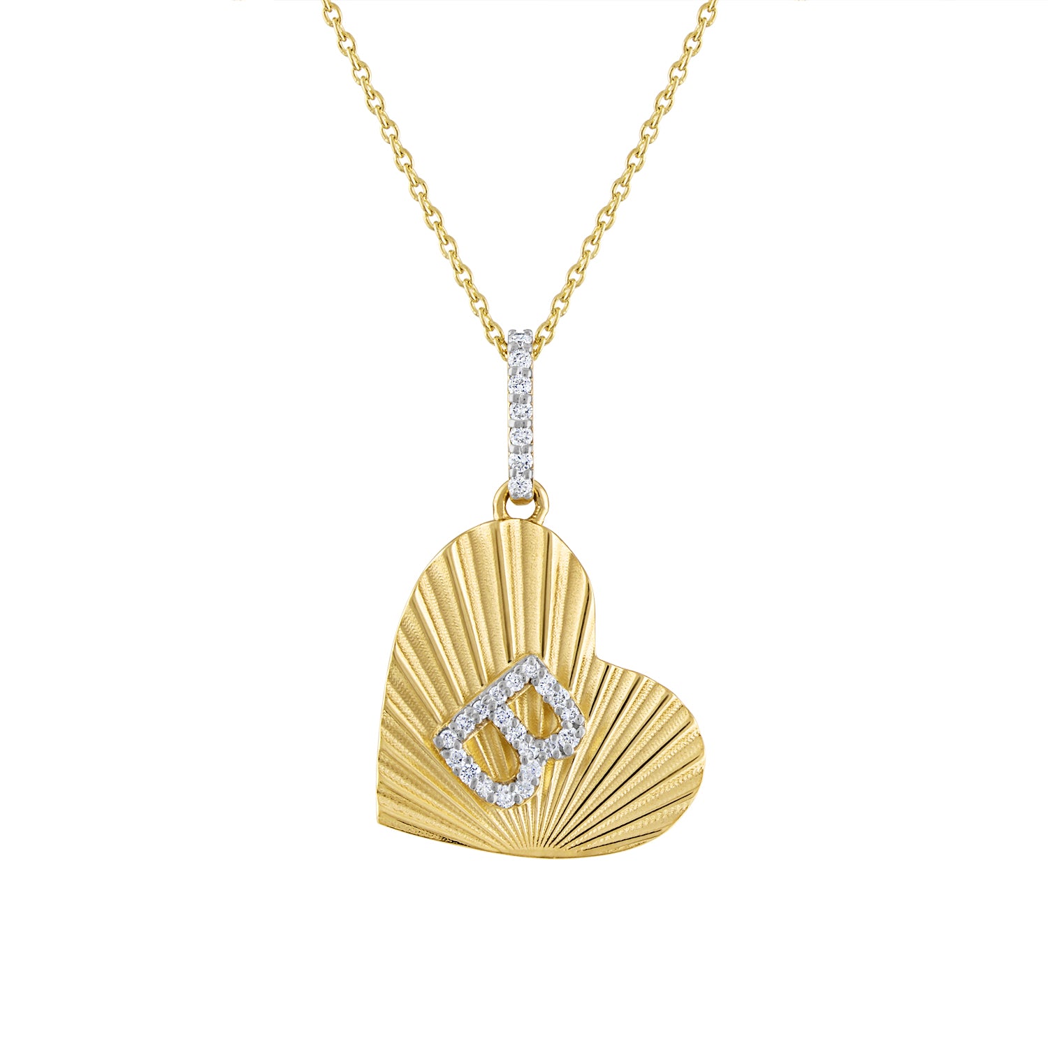 Yellow gold heart necklace with fluting and round diamond initial. 