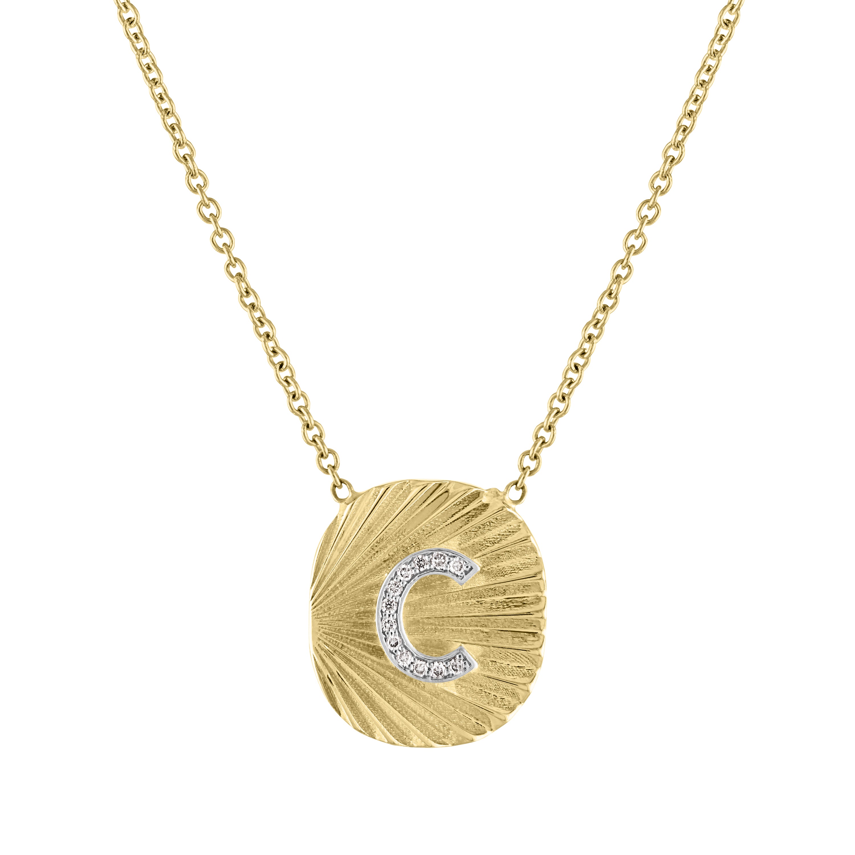 Yellow gold oval shaped necklace with fluting and a diamond initial in the center.