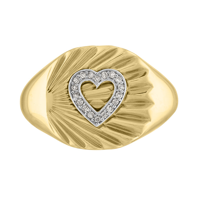 Yellow gold signet ring with fluting and diamond heart in the center.
