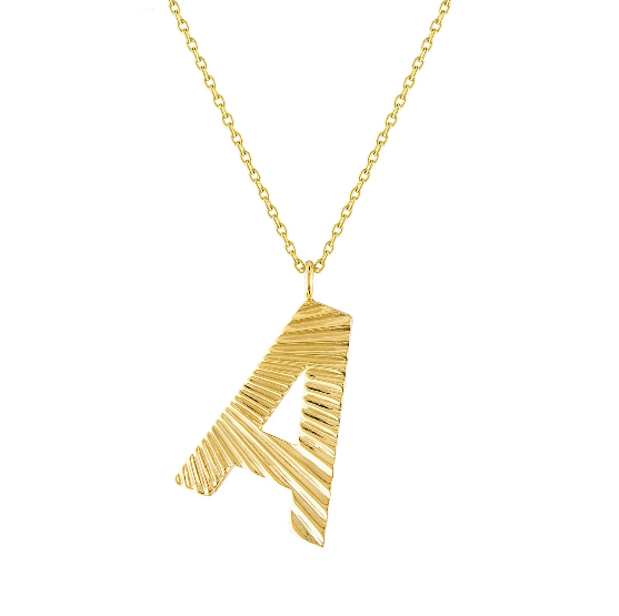 Yellow gold small initial necklace with fluting.