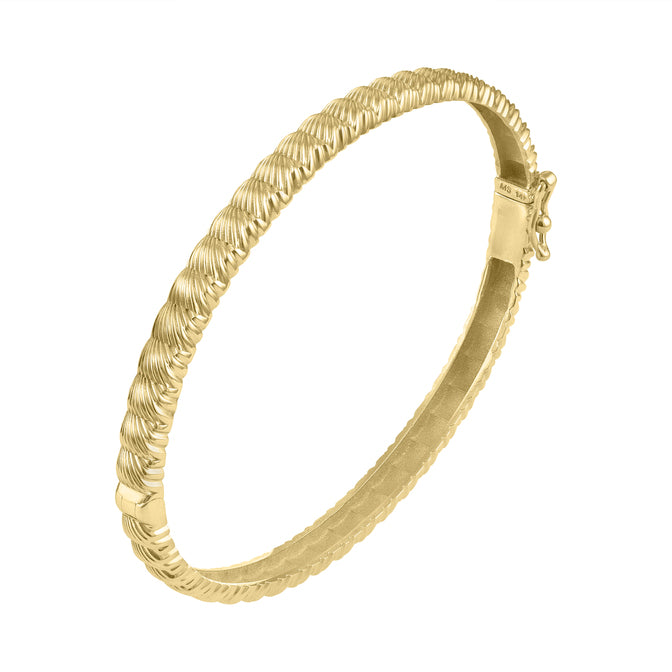 Yellow gold fluted thin bangle. 