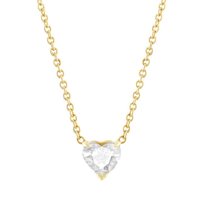 Yellow gold necklace with a white topaz heart in the center. 